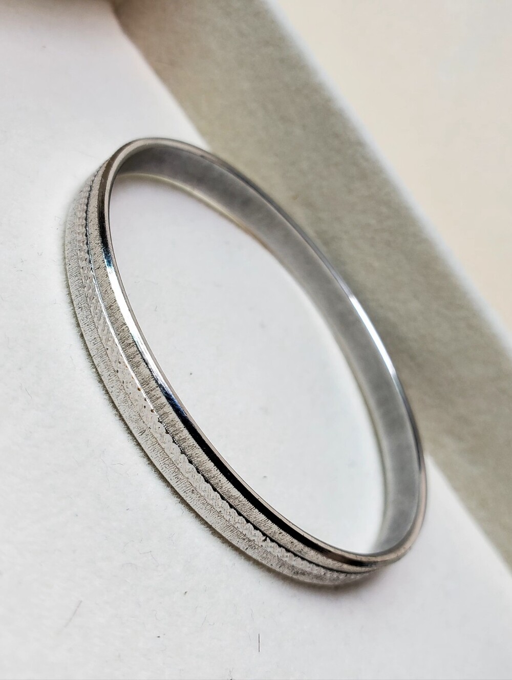 Monet Silver Textured Edge Bangle Bracelet